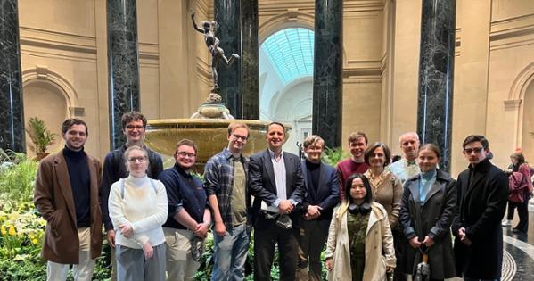 The tour group in the National Gallery of Art's foyer, in front of the fountain.