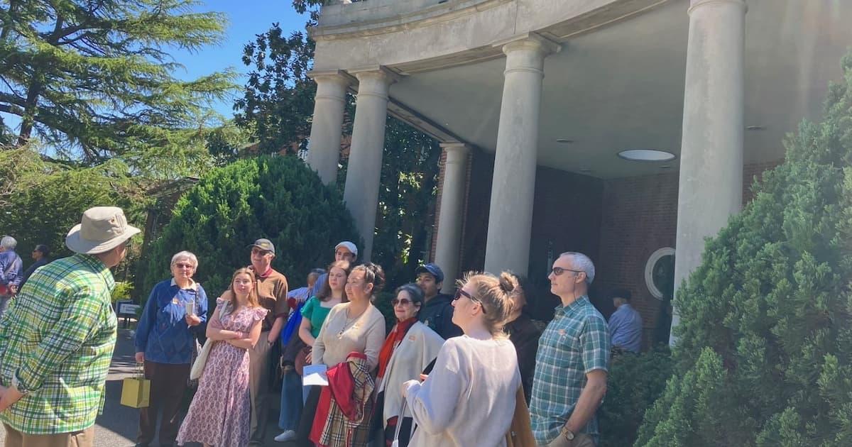 Students and their guide in front of the Hillwood Museum.