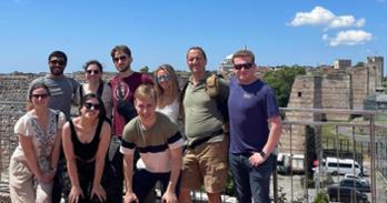 Students and Professor Fedyashin with historic Istanbul towers in the background.