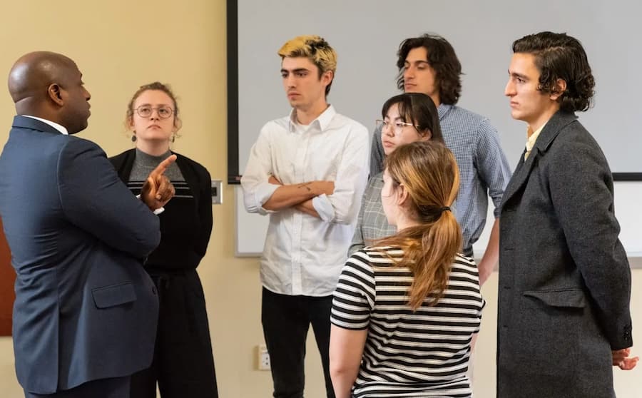 AU health students consulting with a mentor.