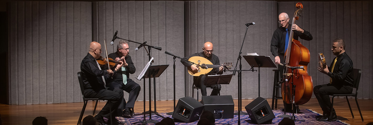 A band plays on stage