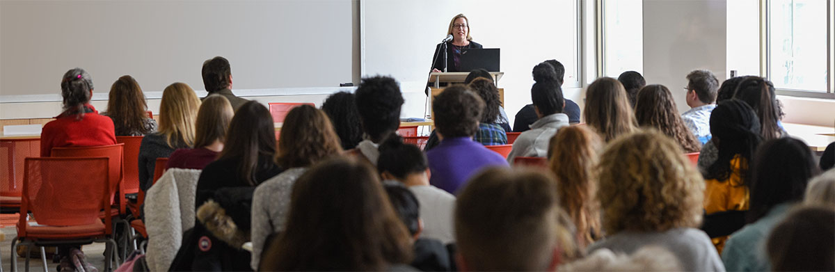 Heather Thiry presenting to students and faculty at STEM summit