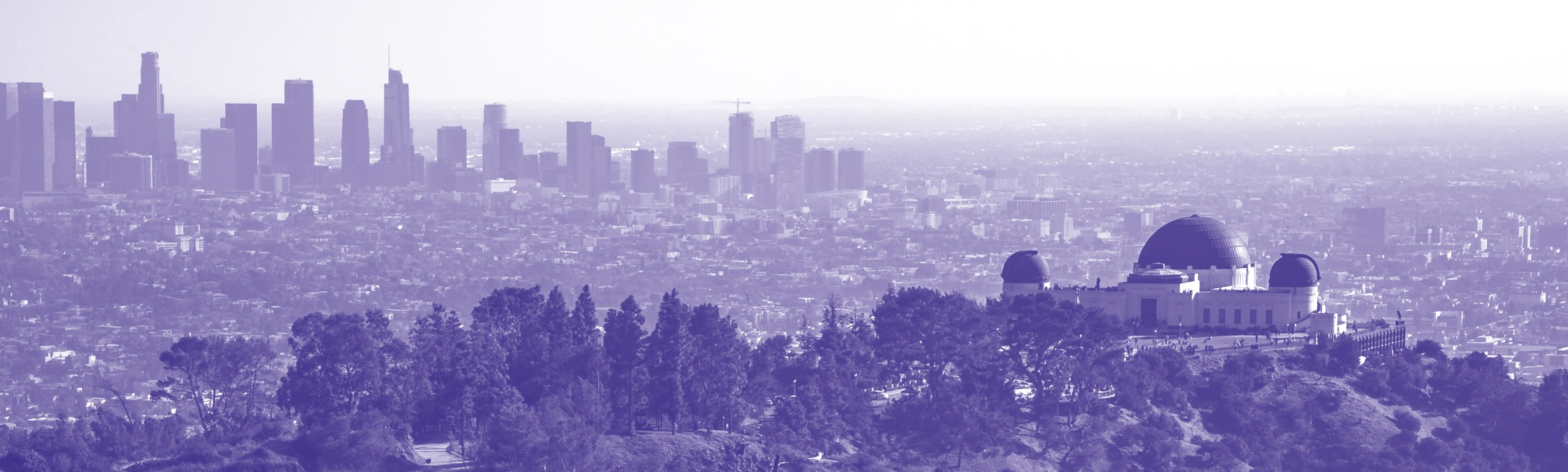 Skyline view of Los Angeles area with Griffith Observatory in the forefront.