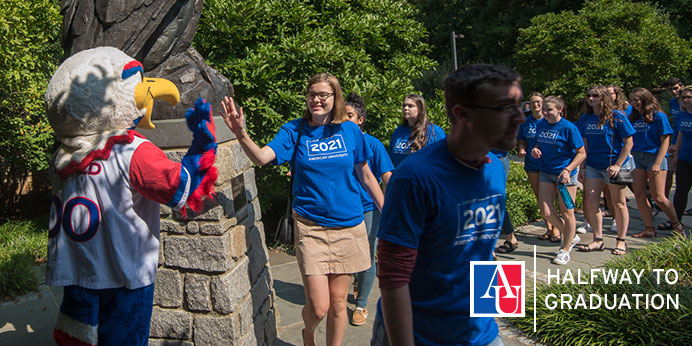 Students of the Class of 2021 walking past Clawed