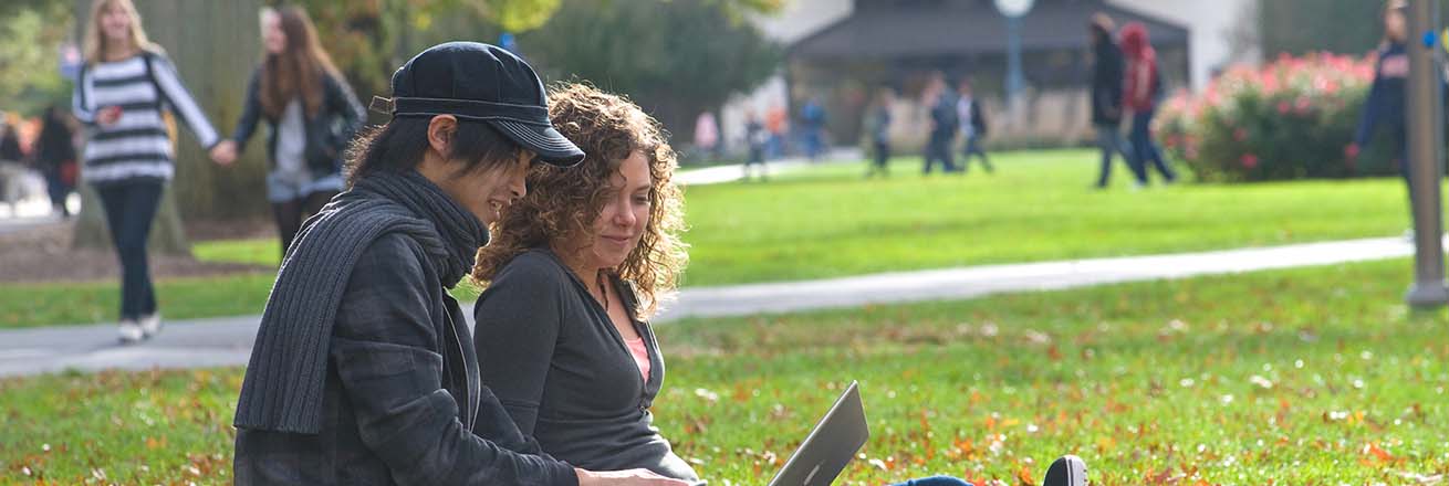 Students sitting on the quad at American University