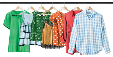 colorful tops hanging on a rack