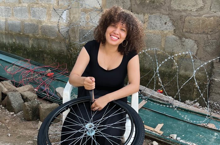 Faith Massey builds a wheelchair in Ghana