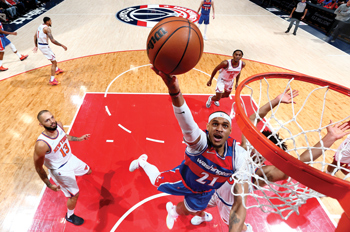 Washington Wizards center Daniel Gafford drives to the rim for a layup