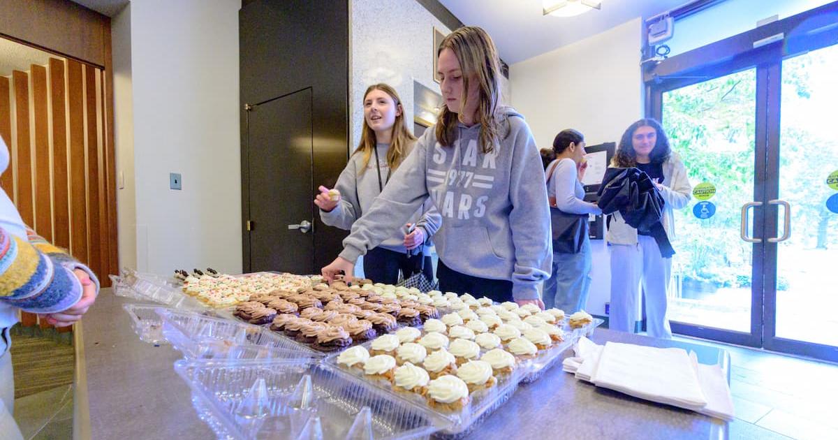 AU students stop by Kay for a cupcake. Photo by Jeff Watts.