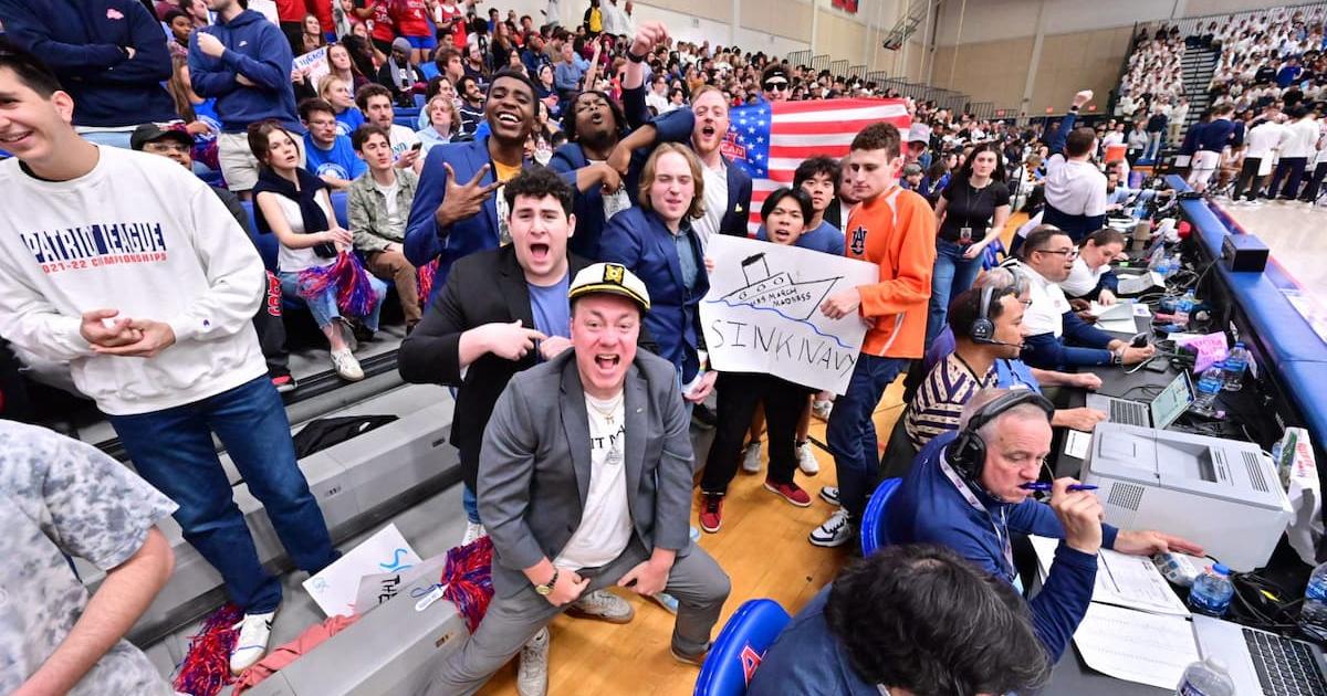 AU Suit Mafia cheers during the AU men's basketball Patriot League Championship win. Photo by Jeff Watts.