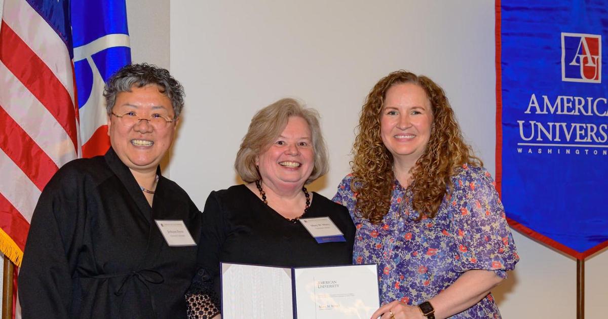 Photo of Provost Wilkins, University Librarian Davis, and University Librarian Emerita Mary Mintz