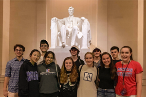 Washington Mentorship Ambassador Michal Klempka with friends at Lincoln Memorial