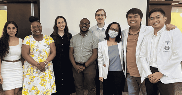 a group photo of students smiling