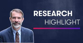 A photo of SIS professor Joshua Rovner next to the words "Research Highlight"