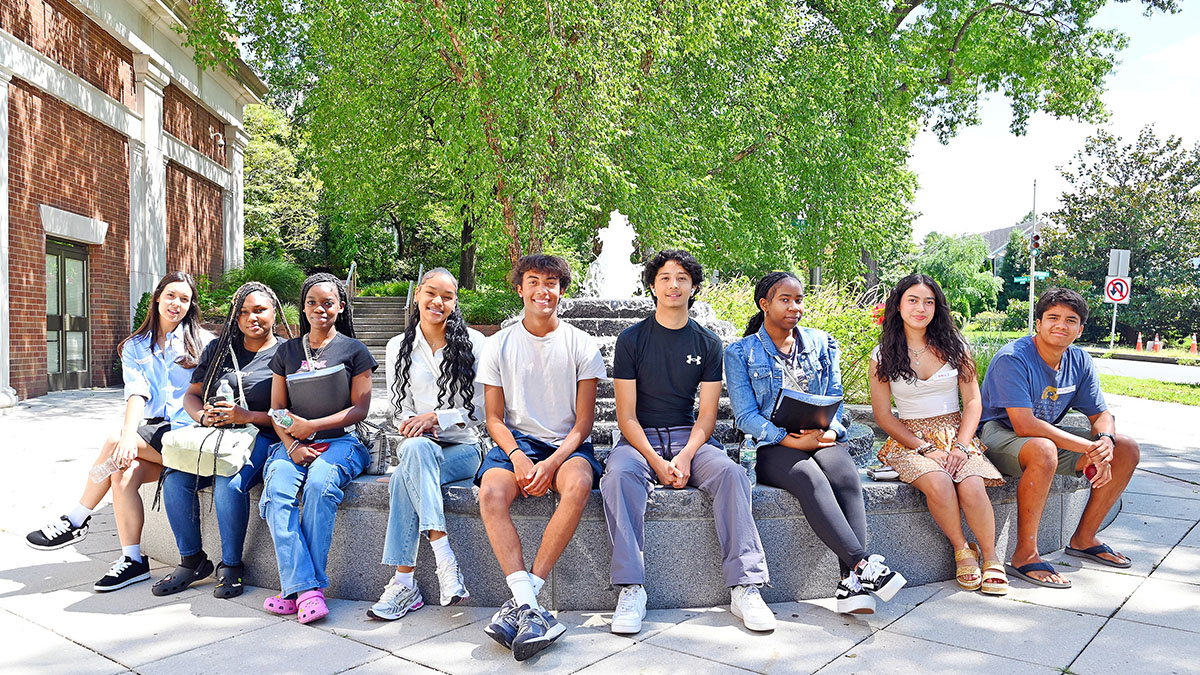 The Fall 2025 Dual Enrollment cohort in front of American University's Spring Valley Building