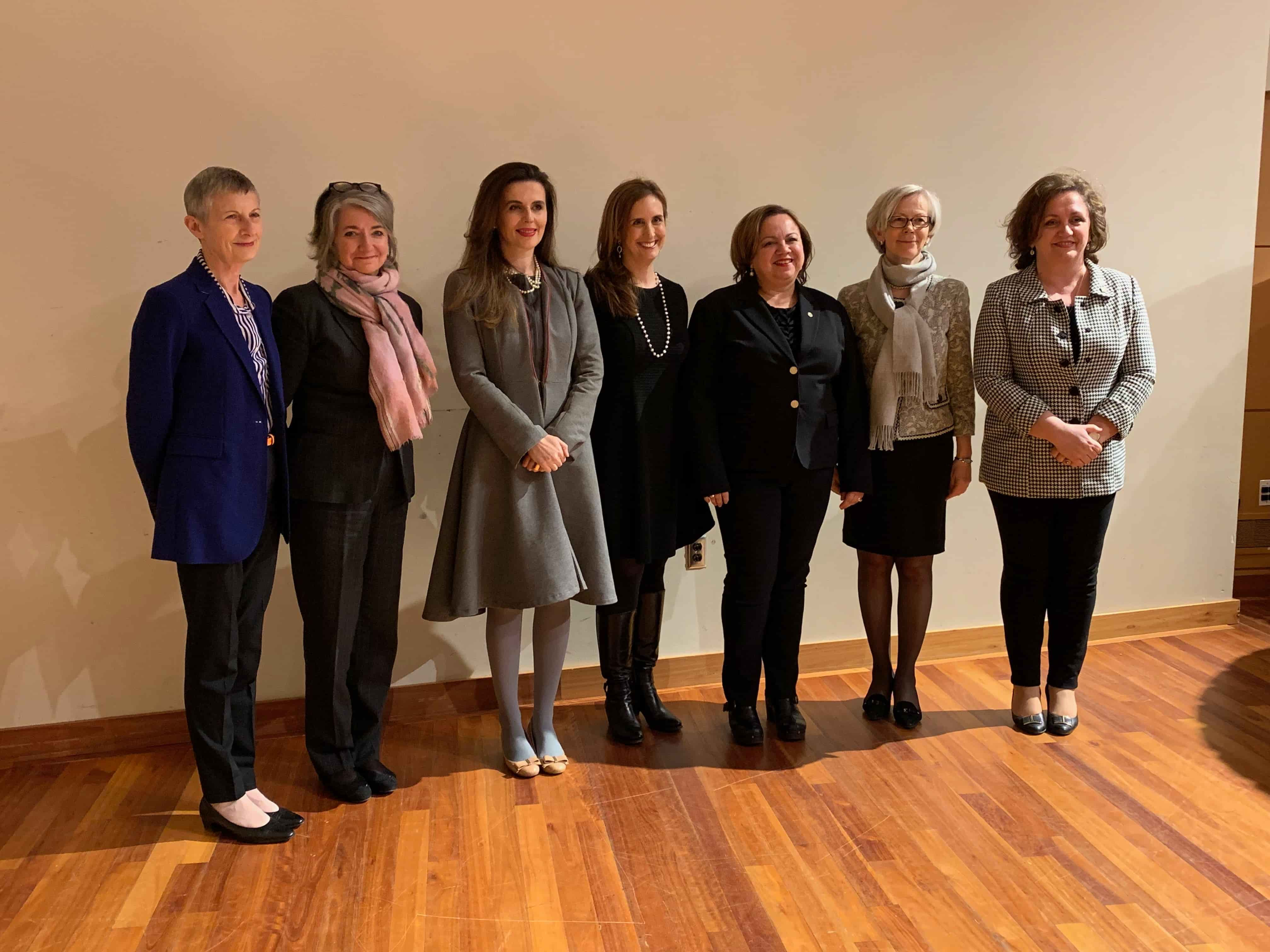 Female ambassadors and moderator Betsy Fischer Martin posing before the panel began