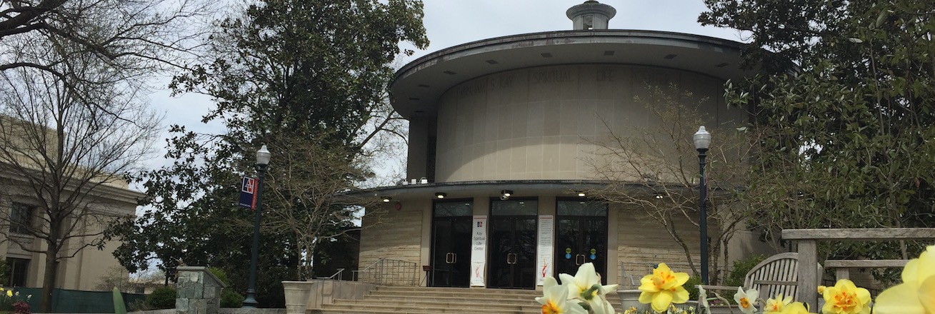 Exterior of Kay Chapel with flowers in foreground