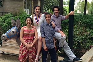 Four Preston children pose on campus at AU.