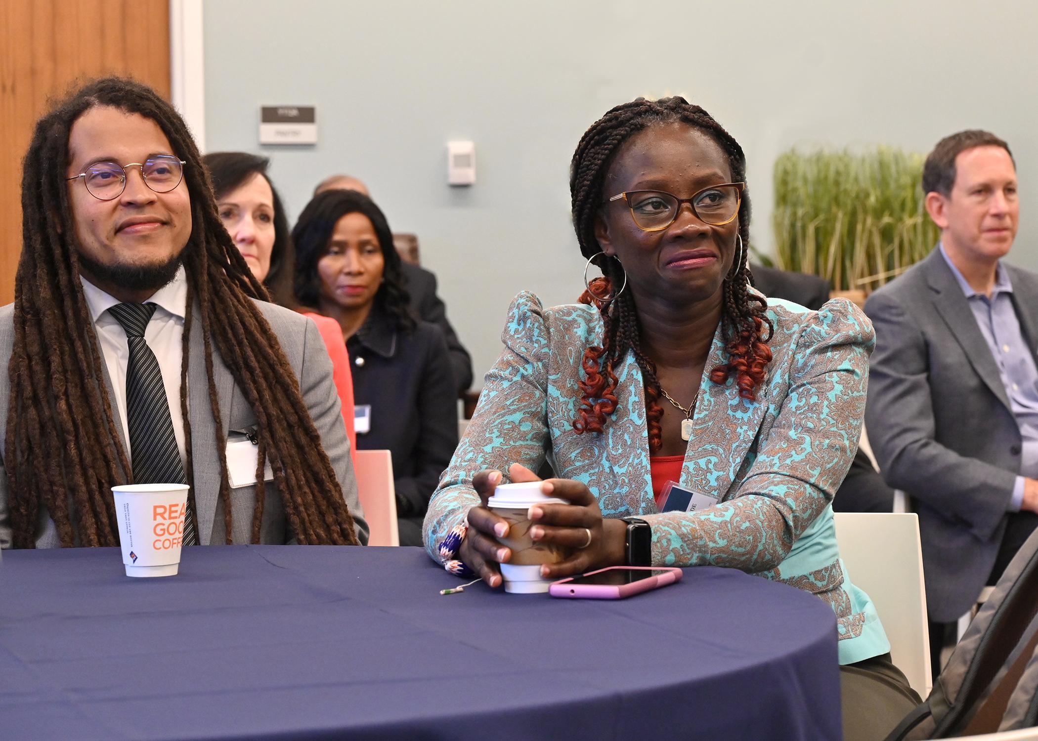 Humphrey Fellows listening intently to Asst.Secretary of State Lee Satterfield  