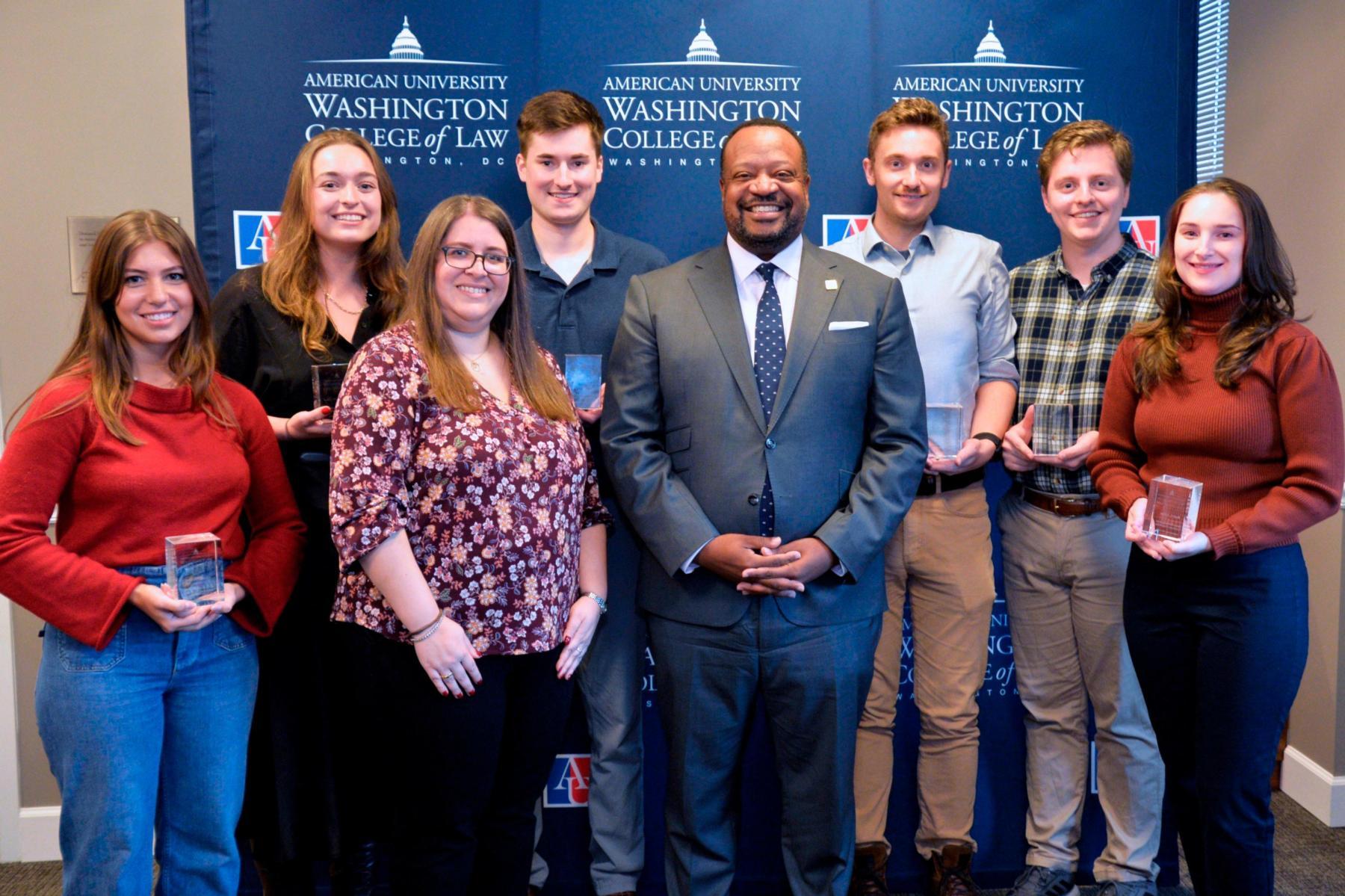 The recipients of the first Dean's Professionalism Certificate pose with AUWCL Dean Roger Fairfax.